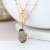 Gold Plated Disc and Smoky Crystal Layered Necklace by Peace Of Mind