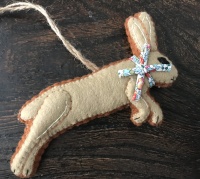 Hand Crafted Felt Leaping Hare with Liberty Bow.