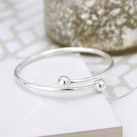 Sterling silver bangle with simple overlapped design by Peace Of Mind