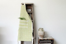 Green stripe and leaf print linen apron by Sam Wilson Studio