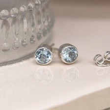 Sterling Silver Faceted Blue Topaz Round Stud Earrings by Peace of Mind