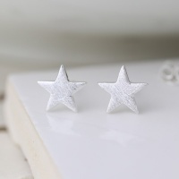 Sterling silver star stud earrings with a scratched finish by Peace Of Mind